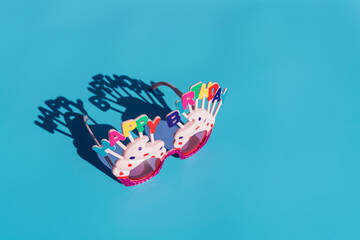 Studio shot of birthday party eyeglasses