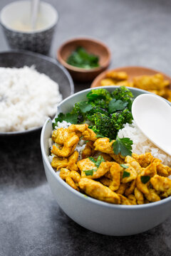 Rice with chicken curry and broccoli