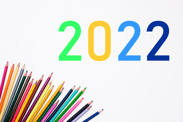 2022 school year with heap colored pencils isolated on white background. Banner. Creative development and education of preschoolers, children and adults. Art stationery shop card. Year color. Mockup