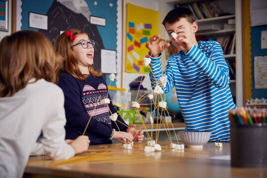 Three children during a science lesson