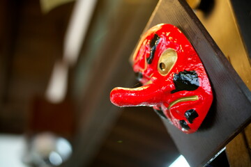 Kyoto,Japan - October 7, 2021: Closeup of a mask of tengu or a long-nosed goblin
