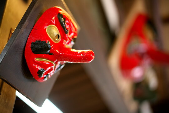 Kyoto,Japan - October 7, 2021: Closeup of a mask of tengu or a long-nosed goblin
