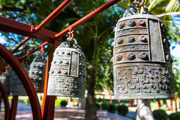 China, Hainan, Sanya, Large ornate bells inside Nanshan Temple