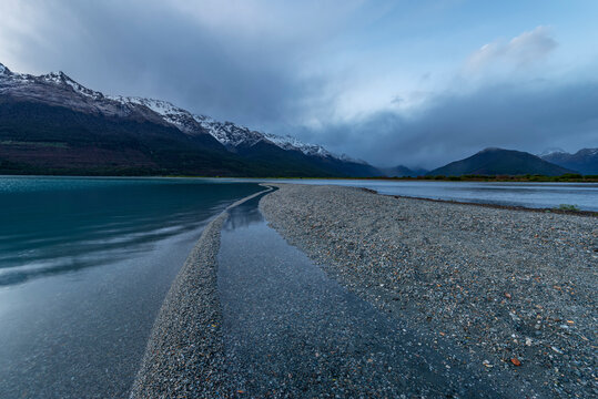New Zealand, Otago, Glenorchy, Shore of Lake Wakatipu with Humboldt Mountains in background