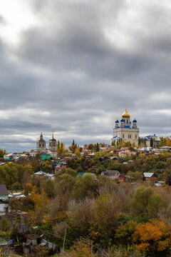 Russia, Lipetsk Oblast, Yelets, Cloudy sky over Yelets Cathedral and surrounding houses