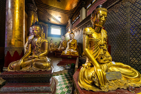 Myanmar, Mon state, Dawei, Gold statues at Shinmokti pagoda