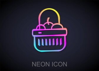 Glowing neon line Shopping basket and food icon isolated on black background. Food store, supermarket. Vector