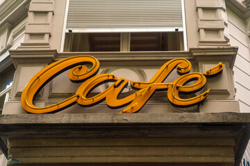 Switzerland, Zurich, Vintage Cafe neon sign on building