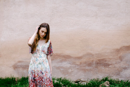 Young woman wearing dress with floral design