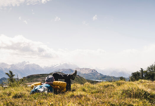 Man relaxing on mountain at Patagonia, Argentina, South America