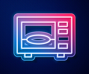 Glowing neon line Microwave oven icon isolated on blue background. Home appliances icon. Vector