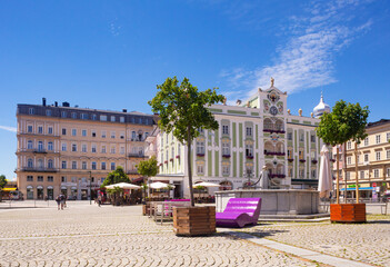 Town hall with ceramic carillon at city square against blue sky, Gmunden, Salzkammergut, Upper Austria, Austria
