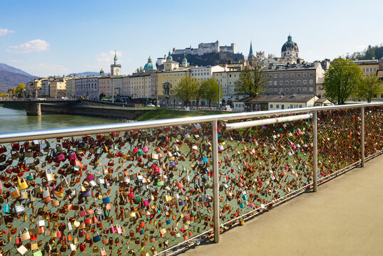 Austria, Salzburg, Love locks on Markatsteg with Hohensalzburg Fortress in background