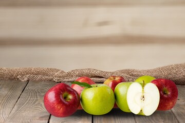 Group of tasty sweet fresh Apple on wooden board background, Fruits concept.