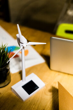 Wind turbine model on desk in office