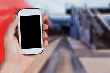 Traveler holds vaccine passport certificate, blank screen smartphone, travel during coronavirus pandemic .