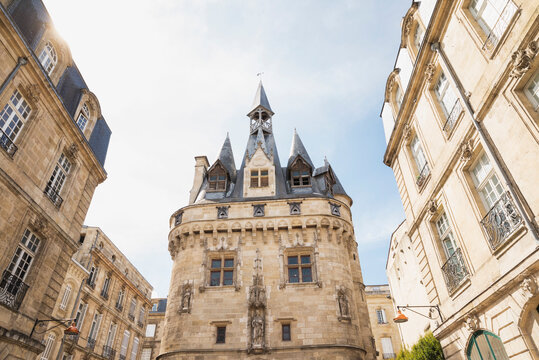 France, Gironde, Bordeaux, Porte Cailhau medieval gate standing between old town residential buildings
