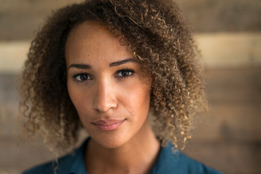 Portrait of young woman with ringlets