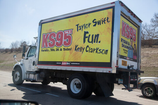 Transport truck advertising the music of Taylor Swift, Kelly Clarkson and the KS95 radio station. St Paul Minnesota MN USA