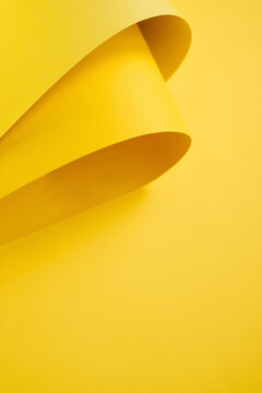 Yellow folded papers as background