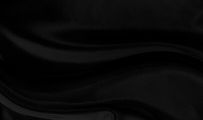 Black gray satin dark fabric texture luxurious shiny that is abstract silk cloth background with patterns soft waves blur beautiful.
