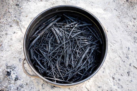Pot filled with self made charcoal
