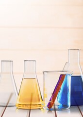 Biological experiment presentation with water in biological test tubes. Production of cosmetics