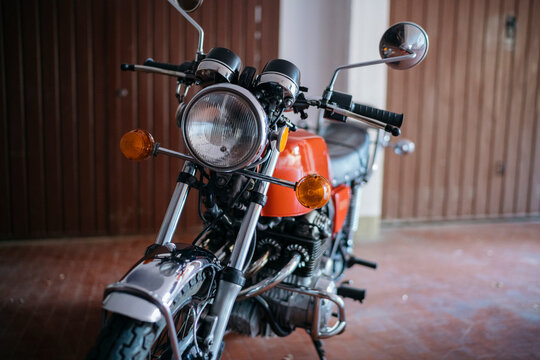 Vintage motorbike parked in garage