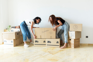 Two friends moving into new home