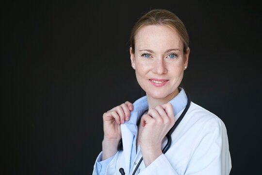 Portrait of confident female doctor