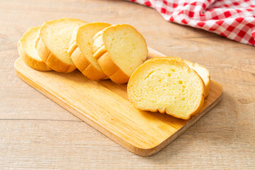 potatoes bread sliced on wood board