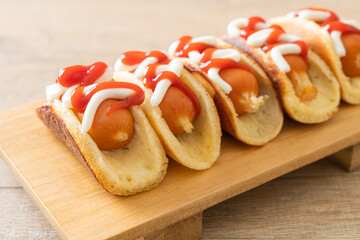flat pancake roll with sausage