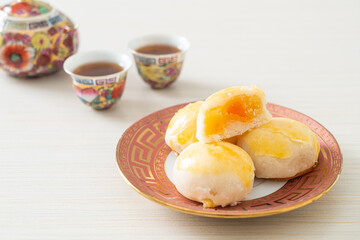 Chinese pastry moon cake with salted egg peanut or Spring Roll pastry with nuts and salted eggs