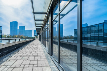 office building reflected on clean glass wall, china