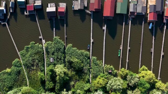 Downward angle drone shot of the docks and float houses of Lake Bokodi in Oroszl&aacute;ny, Hungary.