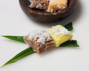 Sweet getuk lindri cake sprinkled with grated coconut as a savory taste enhancer. Getuk is usually made from cassava or cassava. Has a soft texture. Traditional snacks. Focus blur. Focus on some angel