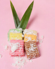 Sweet getuk lindri cake sprinkled with grated coconut as a savory taste enhancer. Getuk is usually made from cassava or cassava. Has a soft texture. Traditional snacks. Focus blur. Focus on some angel