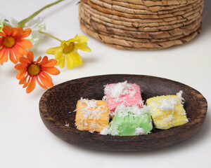 Sweet getuk lindri cake sprinkled with grated coconut as a savory taste enhancer. Getuk is usually made from cassava or cassava. Has a soft texture. Traditional snacks. Focus blur. Focus on some angel