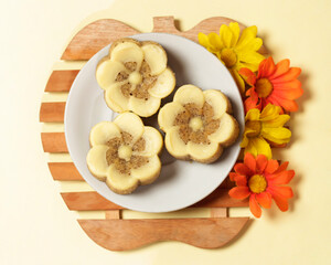 Sweet banana cake as a healthy snack. Bananas are rich in taste and soft on the tongue. This is the right combination to be the right dish when Hari Raya arrives. Banana cake mockup. Focus blur.