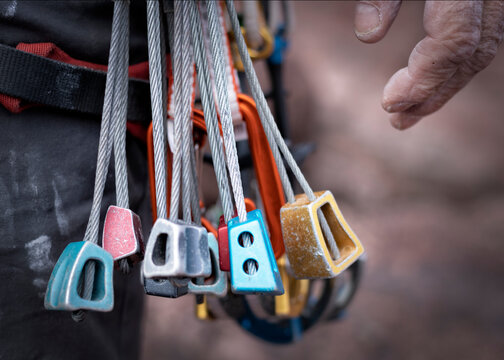 Close up of different rock climbing equipment