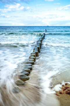 Germany, Heiligendamm, Baltic Sea, breakwater, view from beach to horizon, long exposure