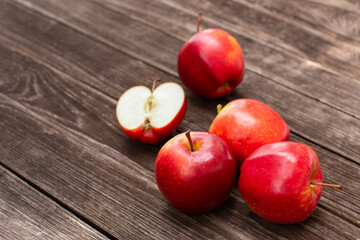 Naklejka na ściany i meble red apples on wooden table