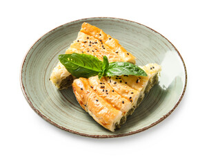 Plate with tasty spinach pie on white background