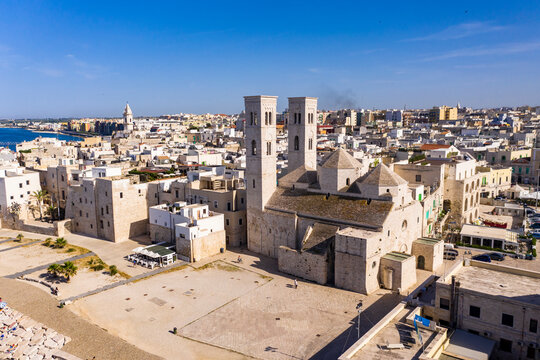 Italy, Province of Bari, Molfetta, Drone view of Church of Saint Conrad and surrounding houses in summer
