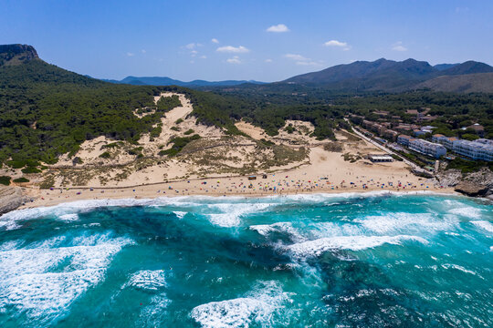 Spain, Mallorca, Cala Mesquida, Aerial view of Cala Agulla beach in summer