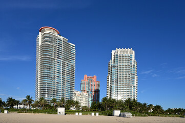 Fototapeta na wymiar South Beach residential buildings in Miami Beach, Florida in early clear summer light.