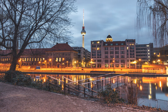 Germany, Berlin-Mitte, View from Fischerinsel over Spree river to Berlin TV Tower in the evening