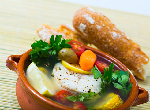 Fisherman's hoosh cooked with alaska pollock, carrots, corn and lemon