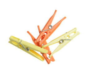 Colorful clothespins on white background