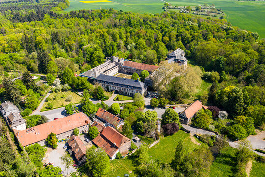 Germany, Hesse, Lich, Helicopter view of Arnsburg Abbey in spring